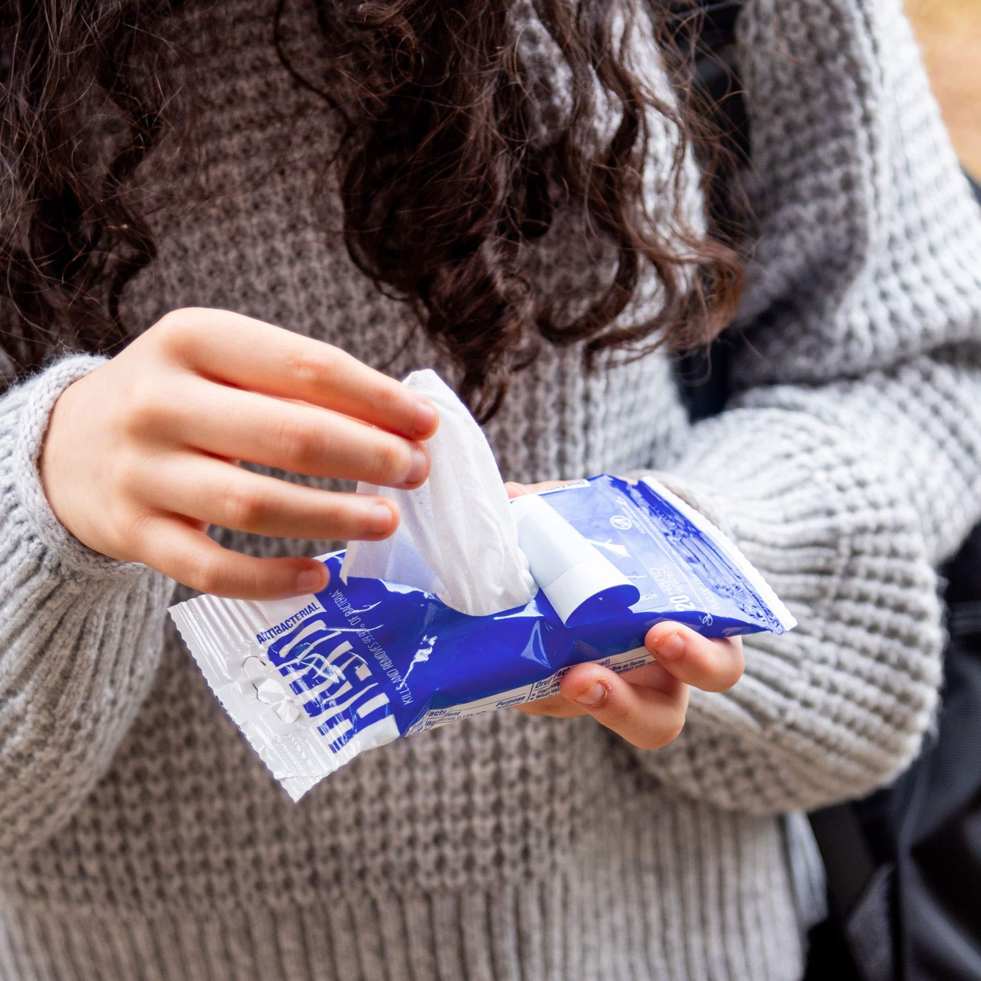 Nice 'N Clean vitamin E wipe illustrating gentle care for sensitive hands
