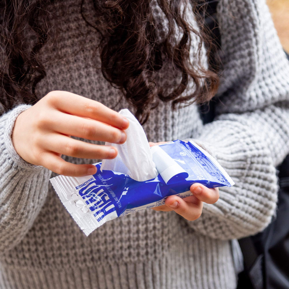Nice 'N Clean vitamin E wipe illustrating gentle care for sensitive hands