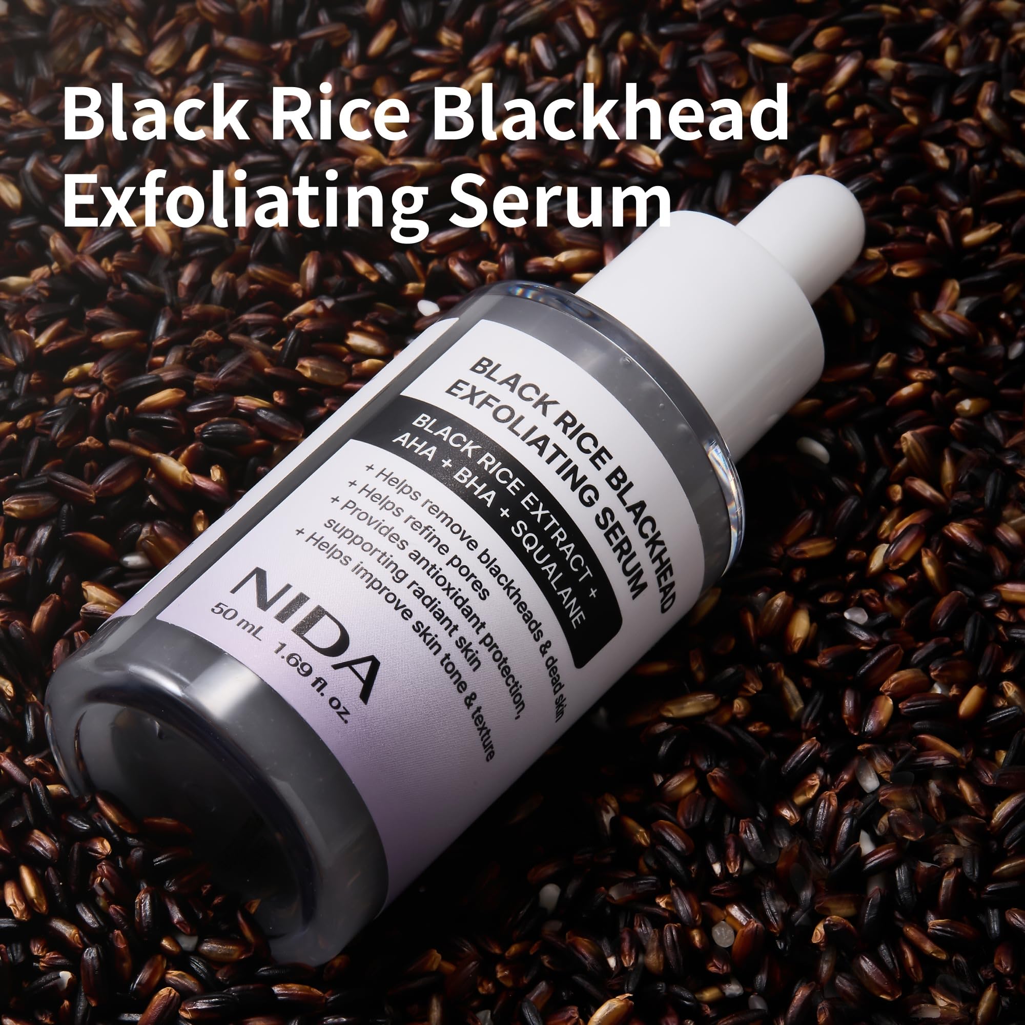 NIDA Black Rice Serum texture closeup shows fine particles for pore refinement.