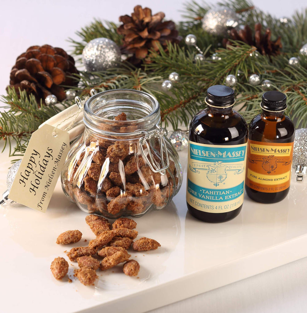 Nielsen-Massey Pure Almond Extract kitchen scene highlighting premium, kosher, gluten-free status.