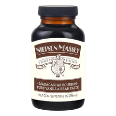 Nielsen-Massey Pure Vanilla Bean Paste bottle with visible specks for richer flavor.