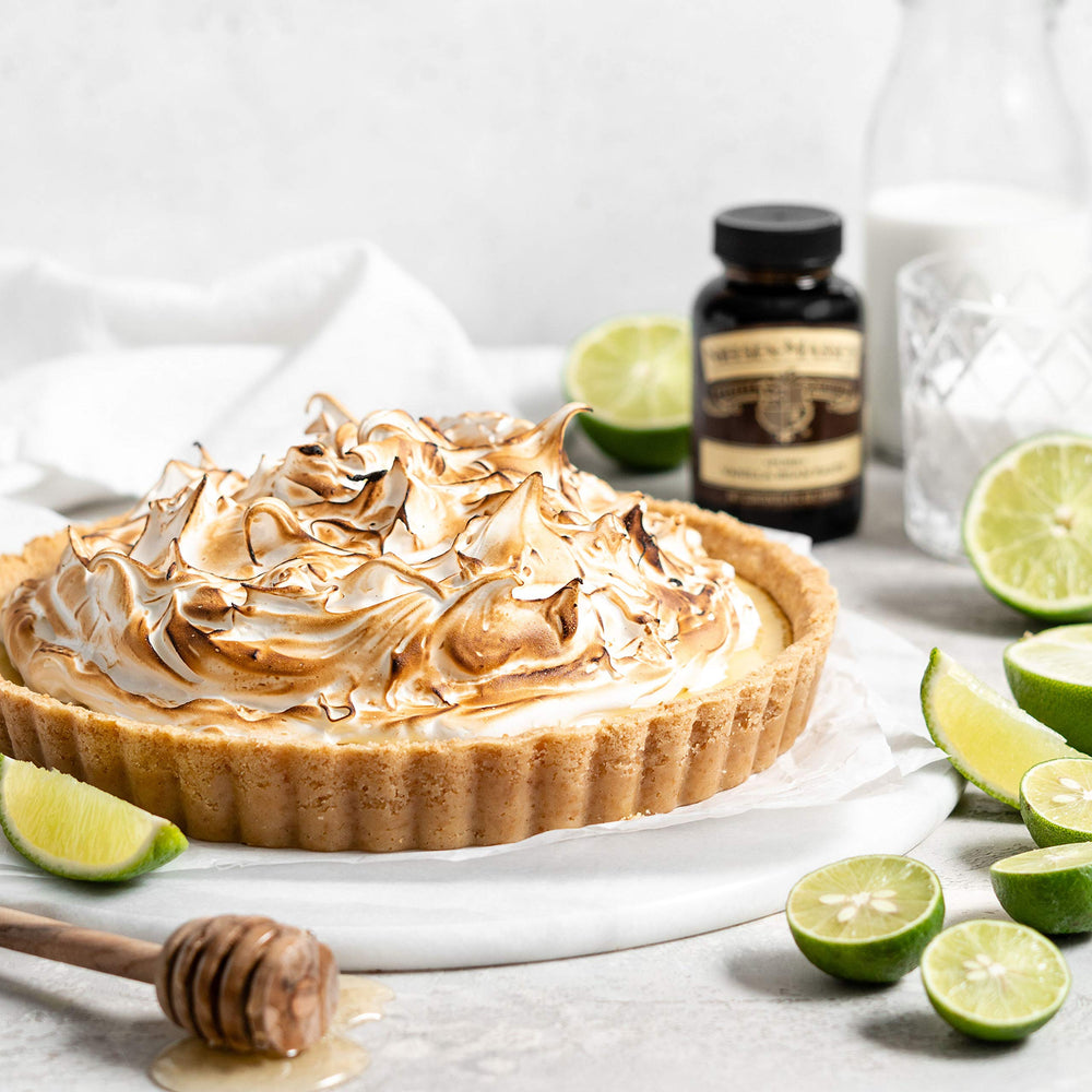 Kitchen scene featuring Nielsen-Massey vanilla bean paste in a baking setup