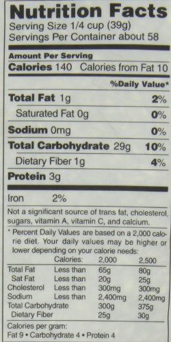 Nishiki Premium Brown Rice raw grains with natural shine close-up.