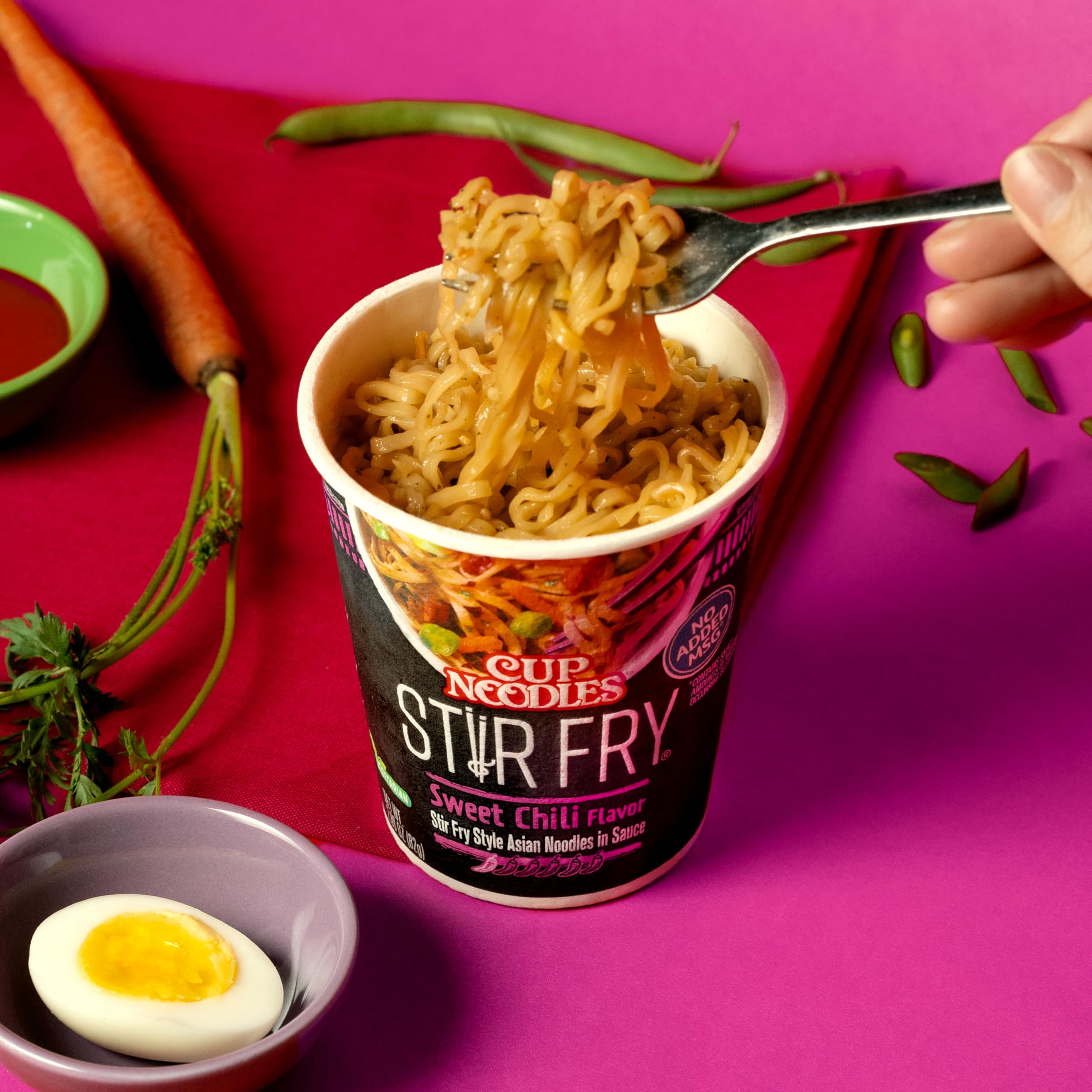 NISSIN Cup Noodles Stir Fry Teriyaki Beef, BBQ, and Hot Garlic Chicken variety pack.