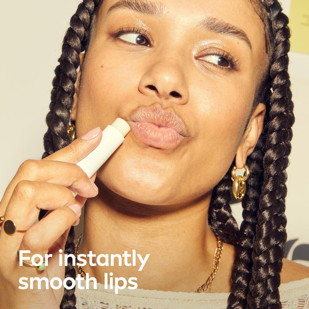 NIVEA Dewy Lip Care on lips with dewy finish and smoother lines.