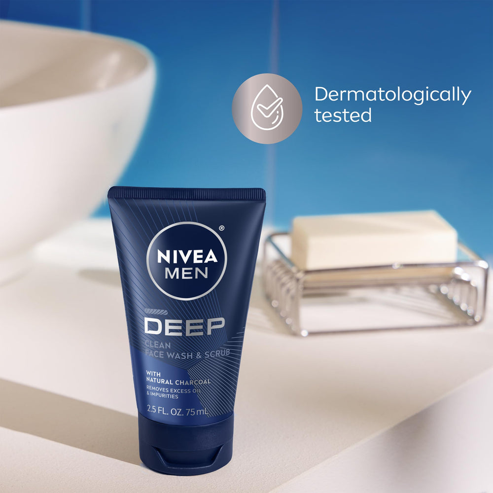 Applying NIVEA MEN Deep Clean charcoal face wash on wet skin.