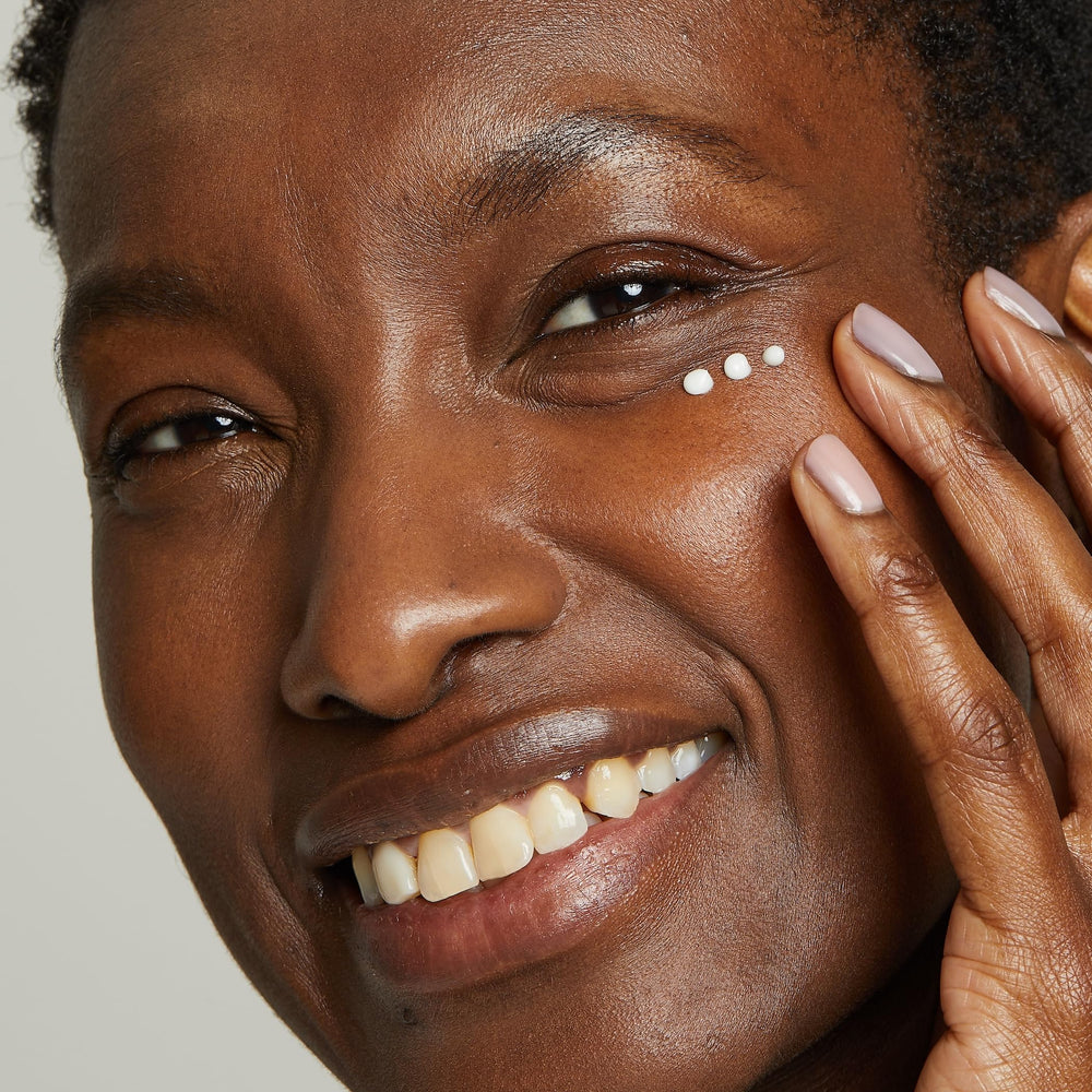 No7 Lift & Luminate vitamin C brightening image highlights radiant under-eye skin.