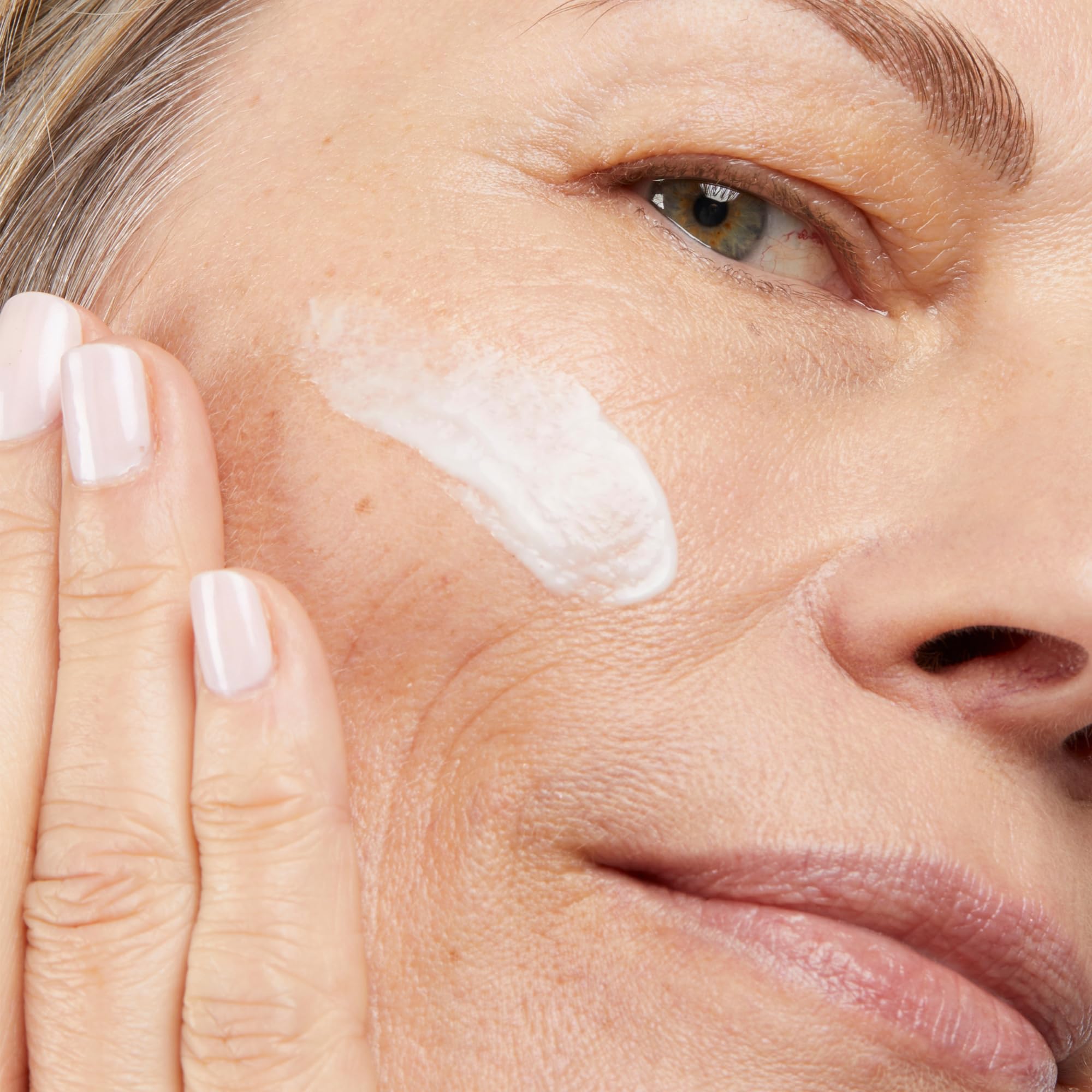 Cream swirl on skin showing absorption and radiance