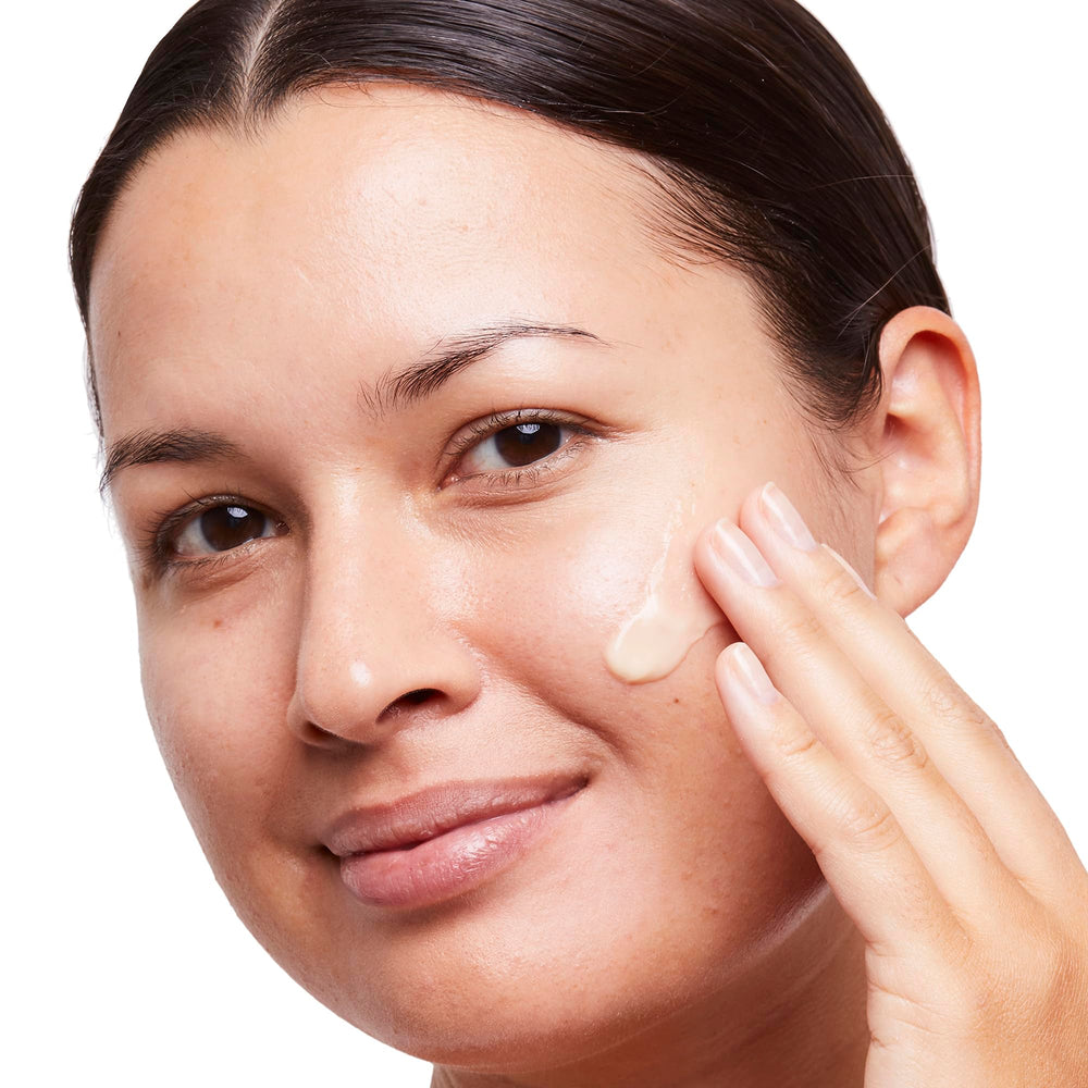 No7 Radiance+ moisturiser on skin during application highlights brightening potential.