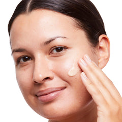 No7 Radiance+ moisturiser on skin during application highlights brightening potential.