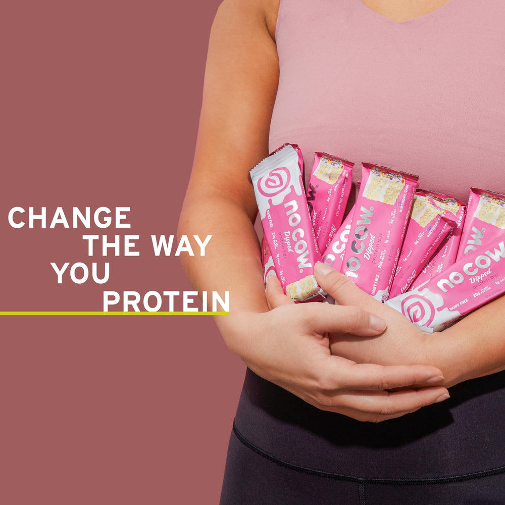 No Cow birthday cake bar in hand, ready-to-eat for on-the-go snacking