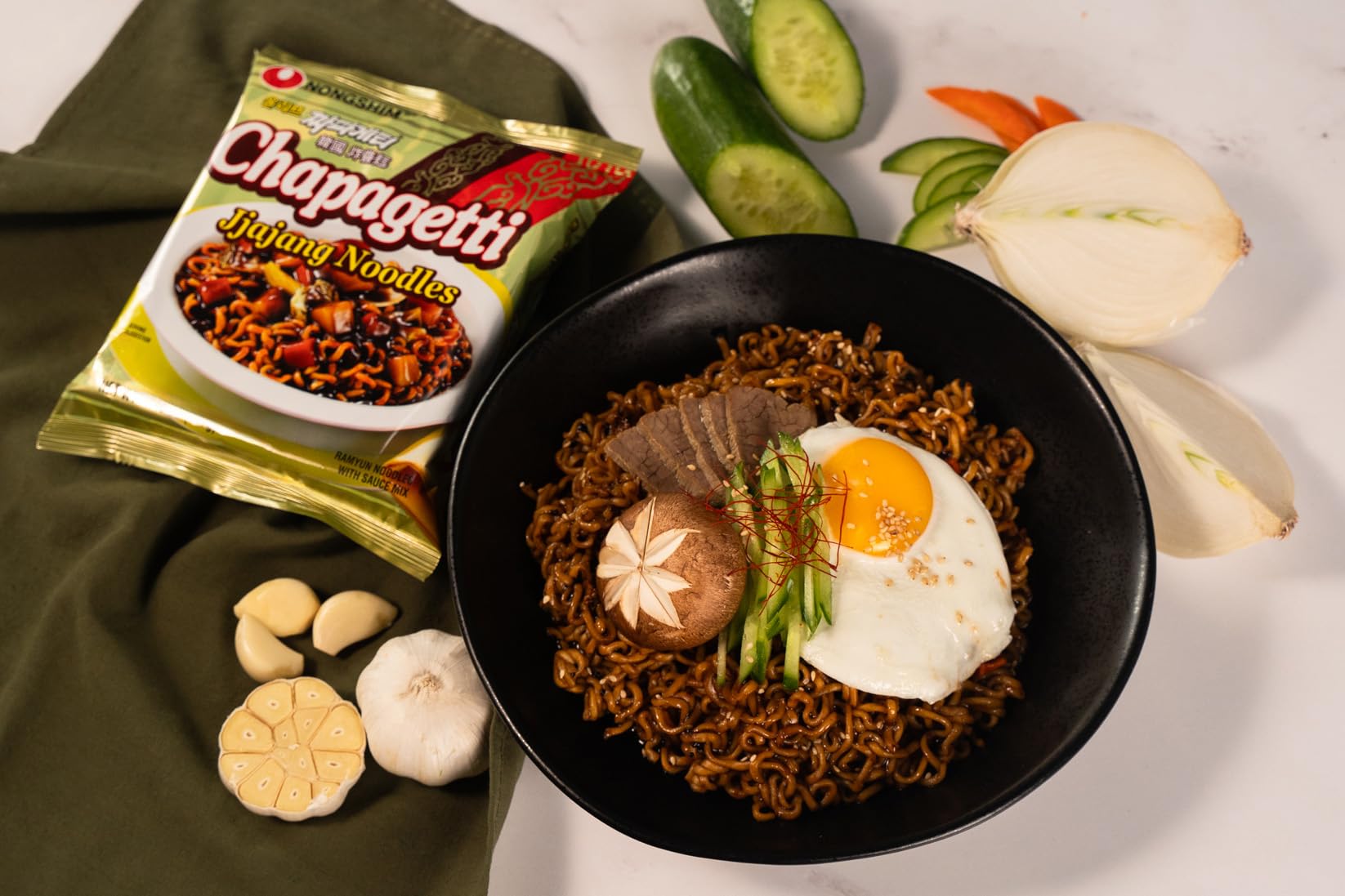 Nongshim Chapagetti cooked noodles in a savory bowl.