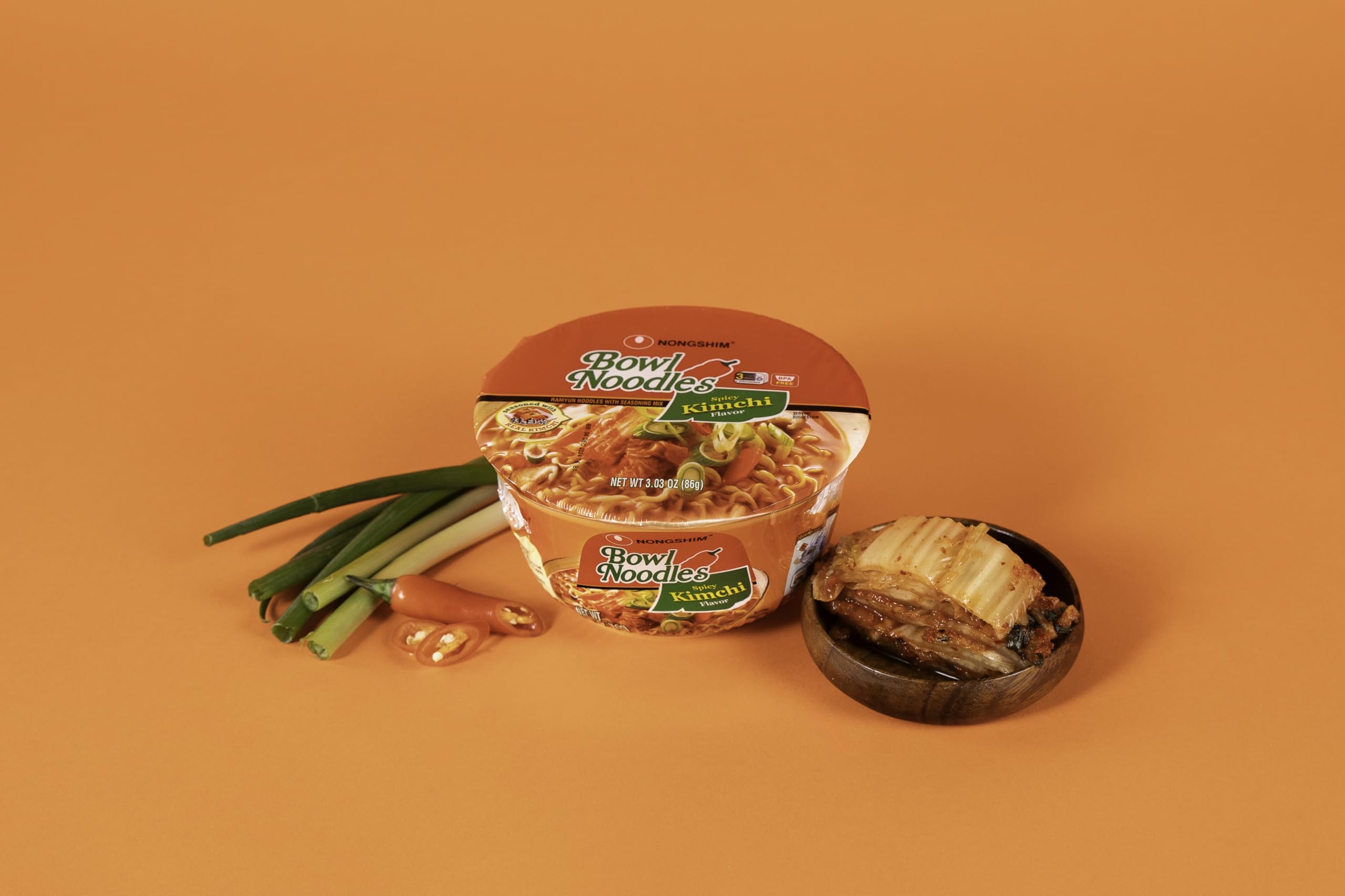 Nongshim Kimchi Bowl stacked in pantry for easy storage