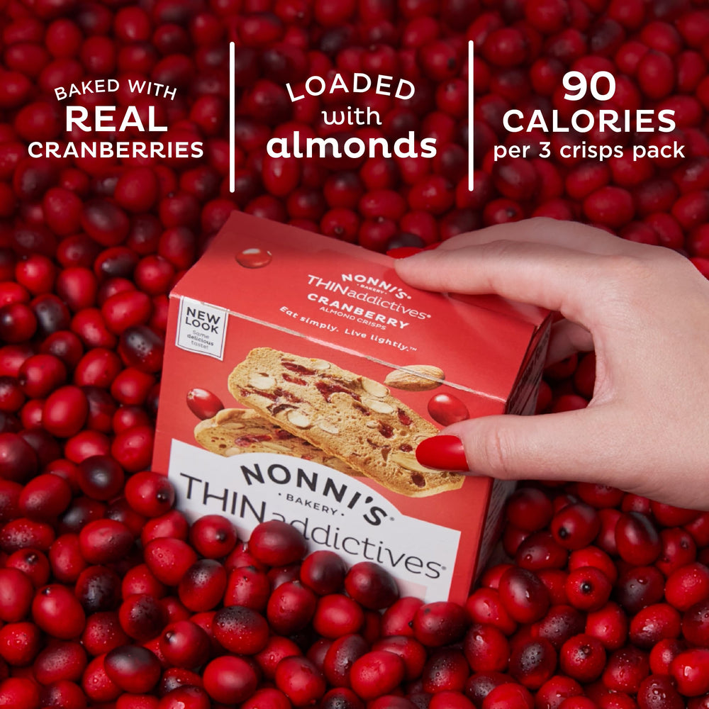 Nonni's Cranberry Almond Thins closeup, tart cranberries and toasted almonds appealing for snacking