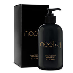 NOOKY Vanilla Massage Oil bottle on wood surface for smooth, hydrated skin.