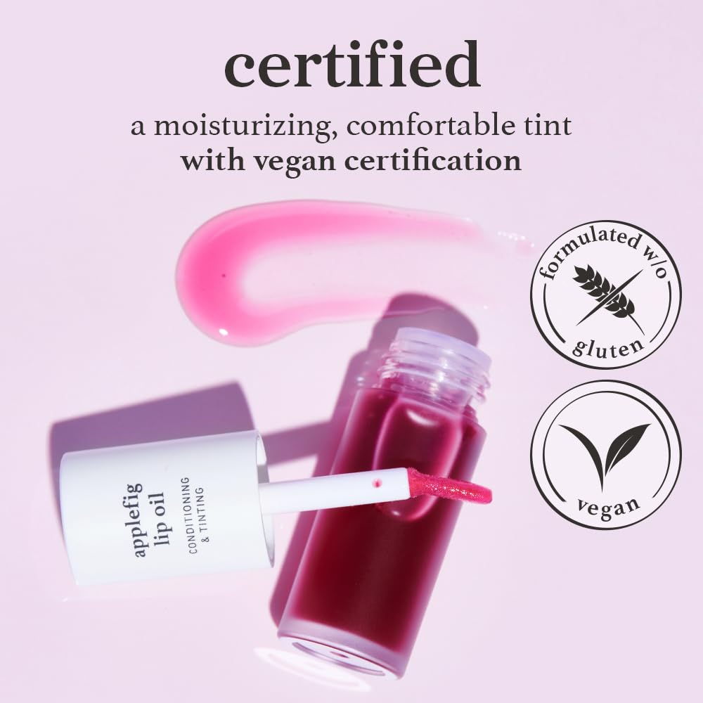Travel-friendly NOONI Lip Oil compact demonstrated for on-the-go hydration.