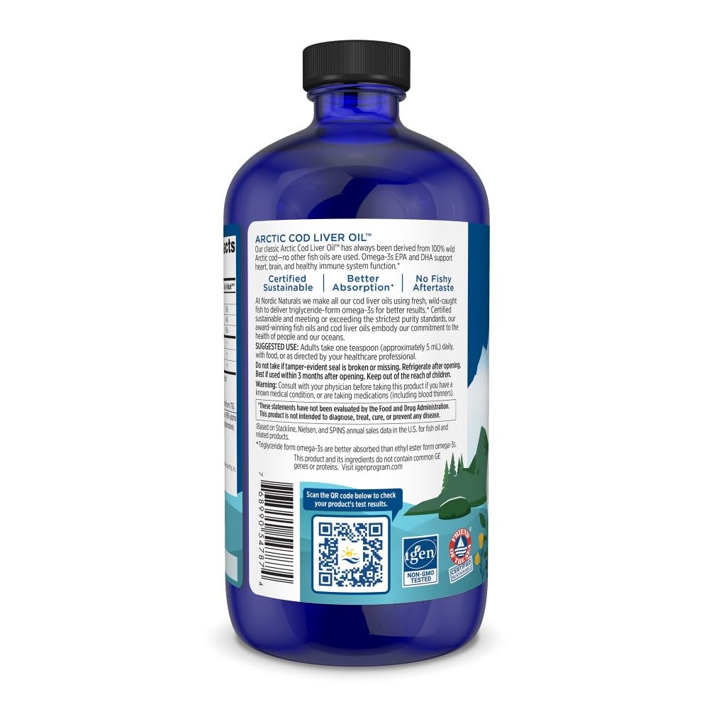 Nordic Naturals Arctic Cod Liver Oil bottle on a bright kitchen shelf.