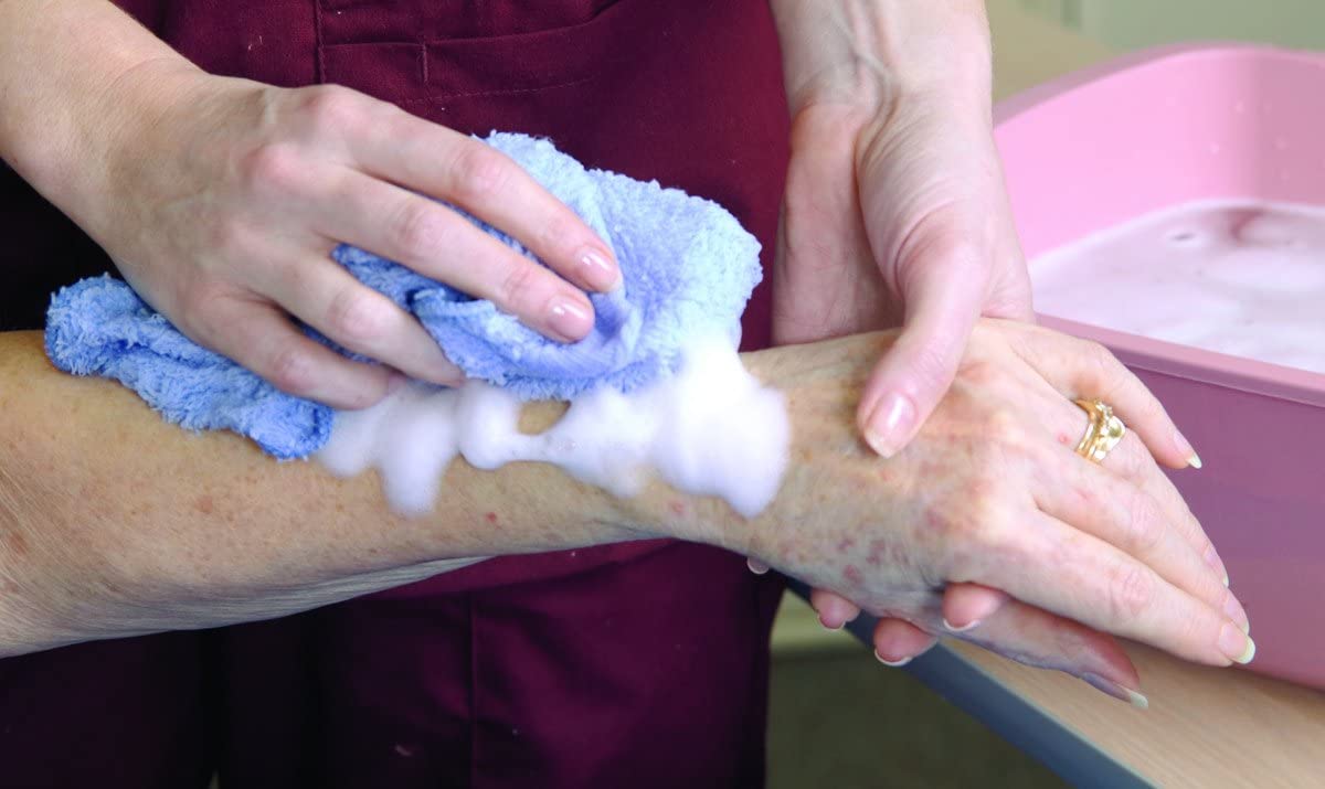 No-Rinse foam-application demonstrates waterless cleansing option.