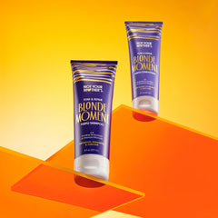 Not Your Mother's Blonde Moment Purple Conditioner closeup showing hydrating, color-retentive formula.