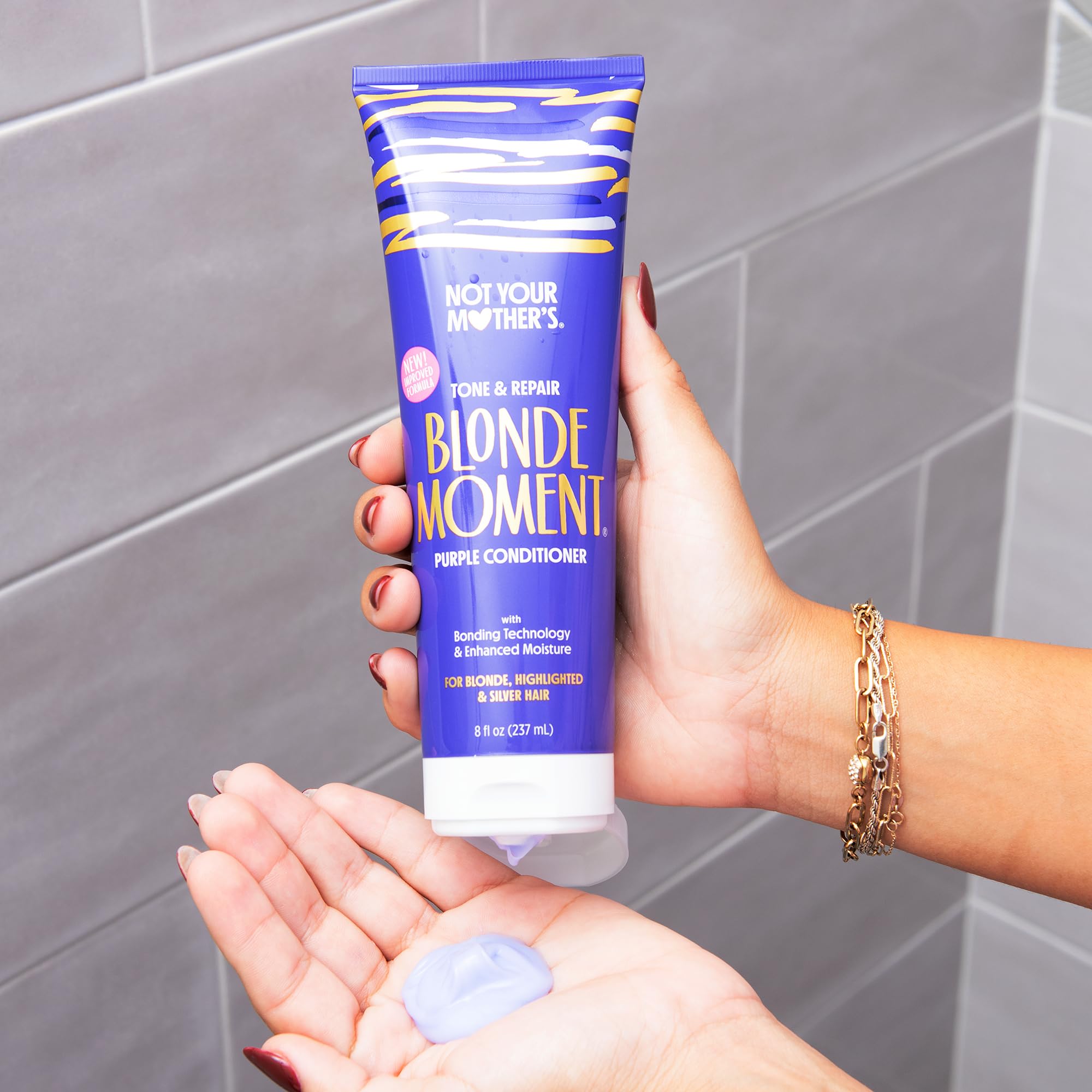 Not Your Mother's Blonde Moment Purple Shampoo foam closeup emphasizing gentle cleansing and violet pigmentation.