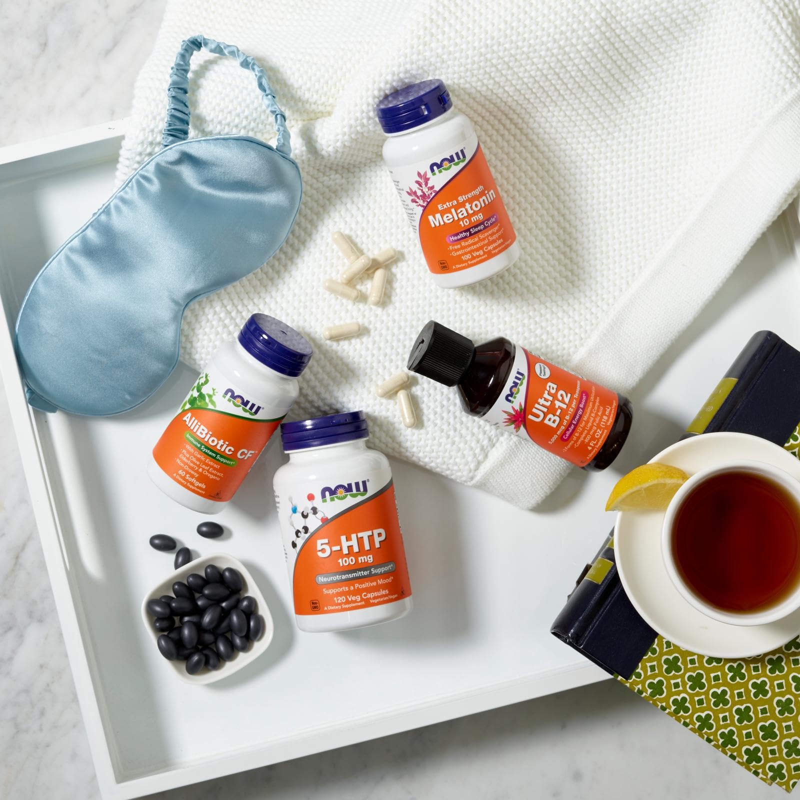NOW Foods 5-HTP certifications badge indicating quality standards.