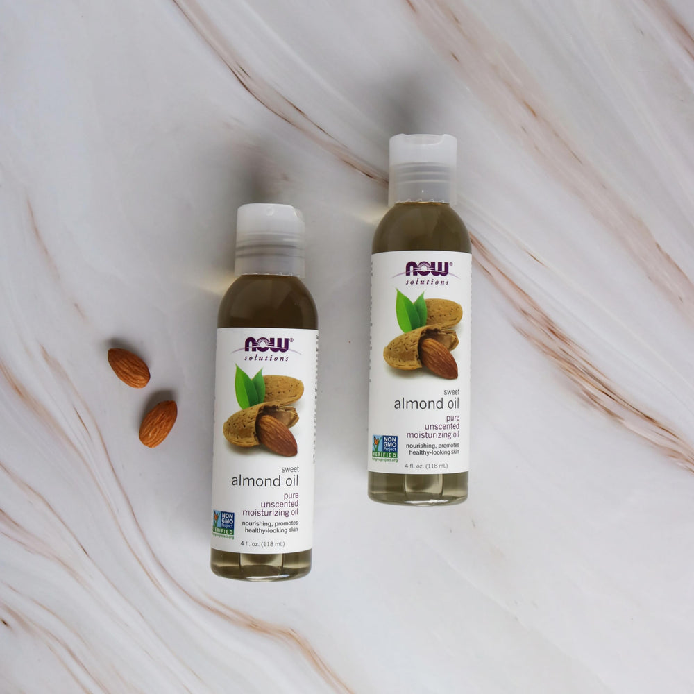 NOW Foods almond oil for face, absorbs quickly without clogging pores.