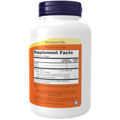 NOW Foods Black Currant Oil softgel capsules close-up showing texture.