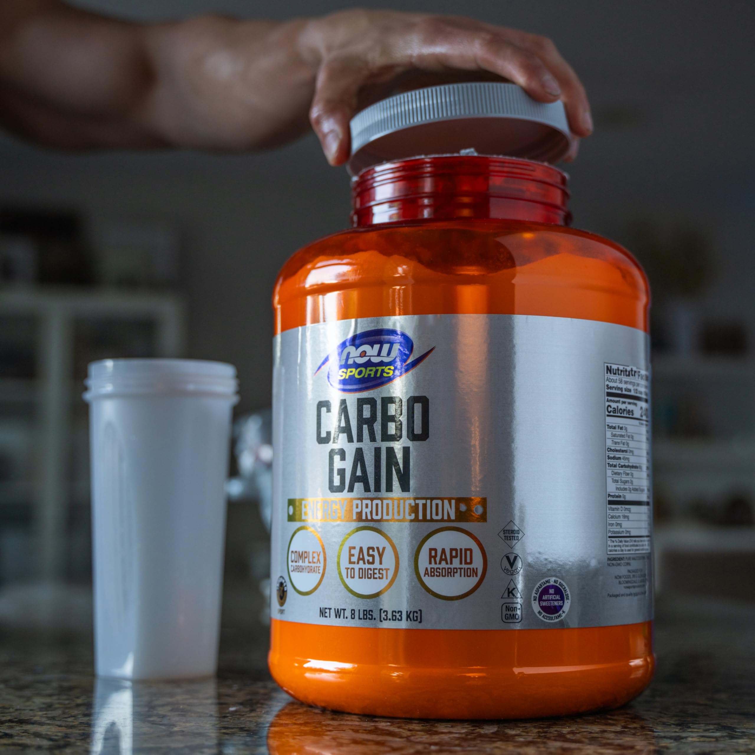 NOW Foods Carbo Gain dissolving in water for rapid energy during exercise