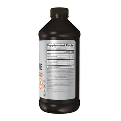NOW Foods L-Carnitine Liquid being poured into a glass for easy mixing.