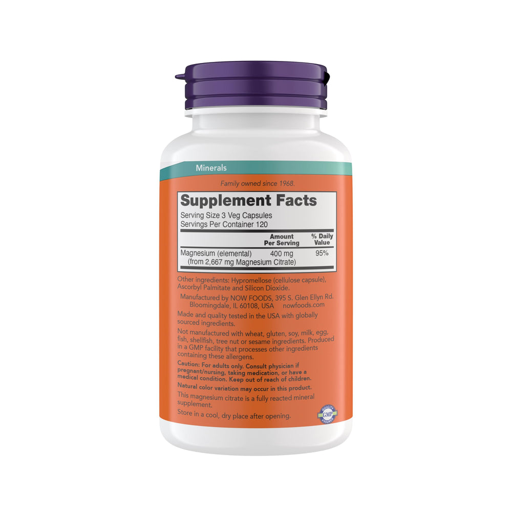 NOW Foods Magnesium Citrate capsules close-up showing powdery texture for easy intake.