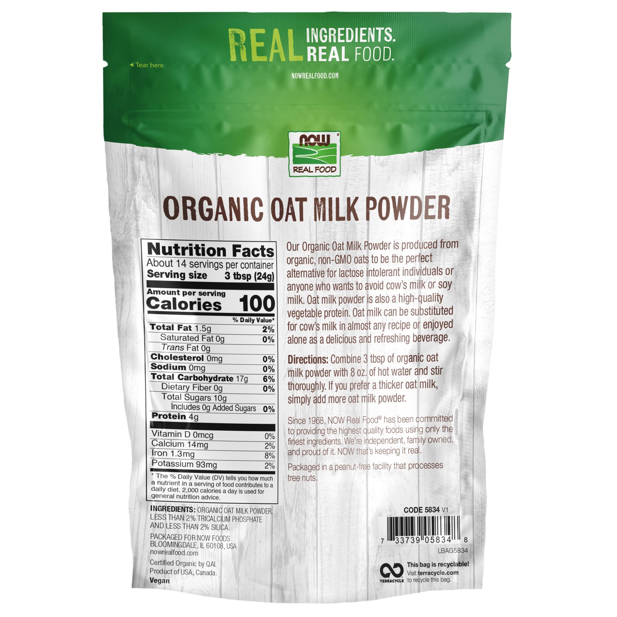 NOW Foods Oat Milk Powder cup shows dairy-free option ready for coffee or tea.