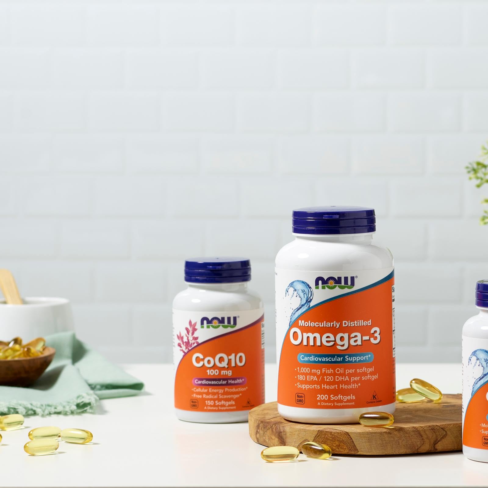 NOW Foods Ultra Omega-3 softgels in hand for easy use