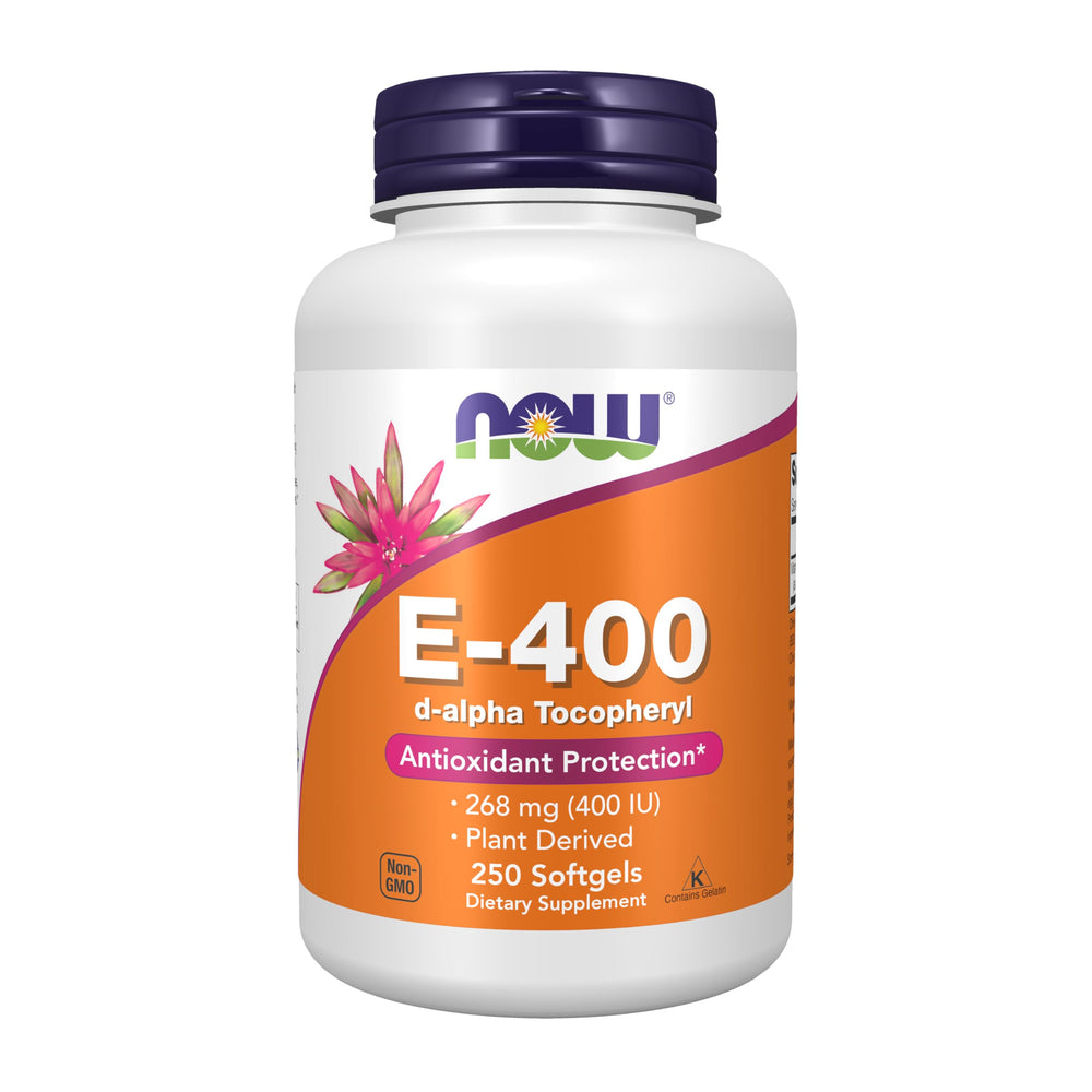 NOW Foods Vitamin E 400 IU softgel bottle on desk, offering antioxidant protection