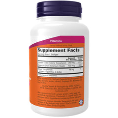NOW Foods Vitamin E-400 IU bottle on kitchen counter showing easy daily supplementation.