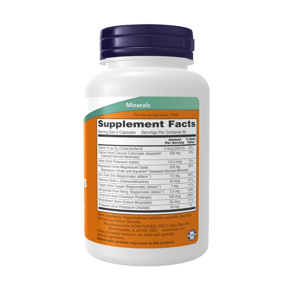 NOW Foods Full Spectrum Mineral Caps capsules close-up emphasizing iron-free formula and calcium-magnesium balance