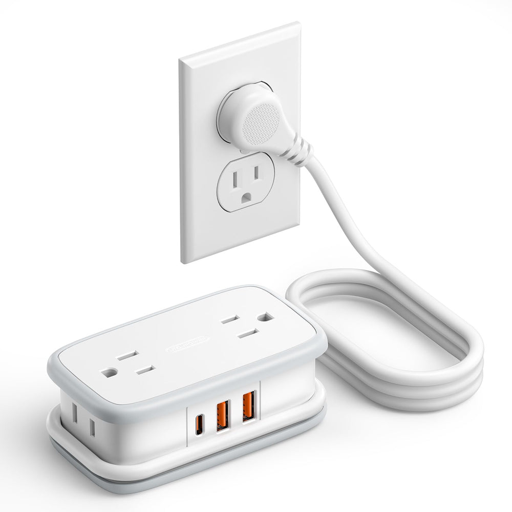 NTONPOWER travel power strip with four outlets and three USB ports for hotel room charging.