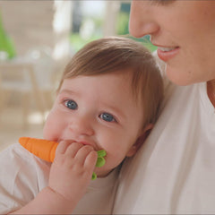 Nuby carrot teether with vibrant colors for sensory exploration