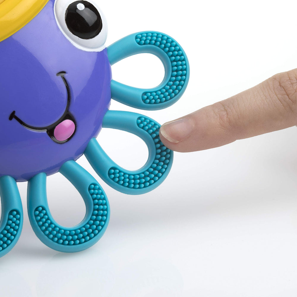 Nuby Vibe-eez teether with nub-eez massaging bumps softly cushions gums.