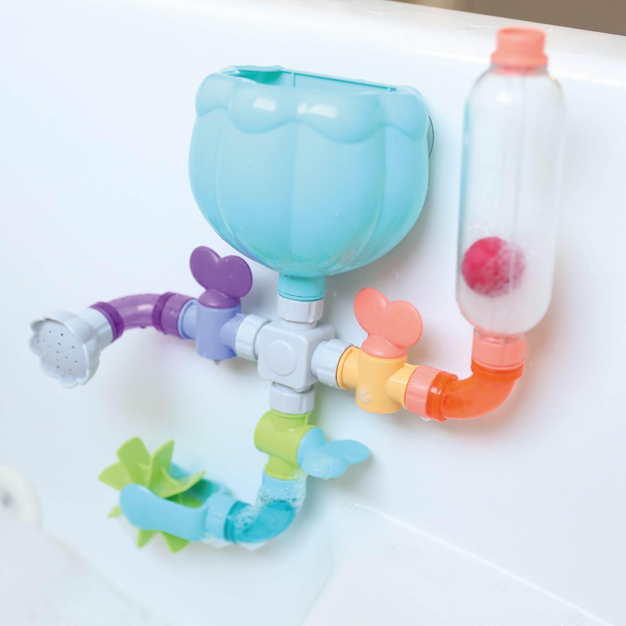 Nuby Wacky Water Works helps you explore different combinations for entertaining bath time experiments