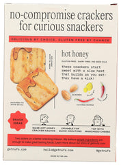 Nufs Hot Honey Crispy Crackers texture closeup emphasizes crunch and seasoning.