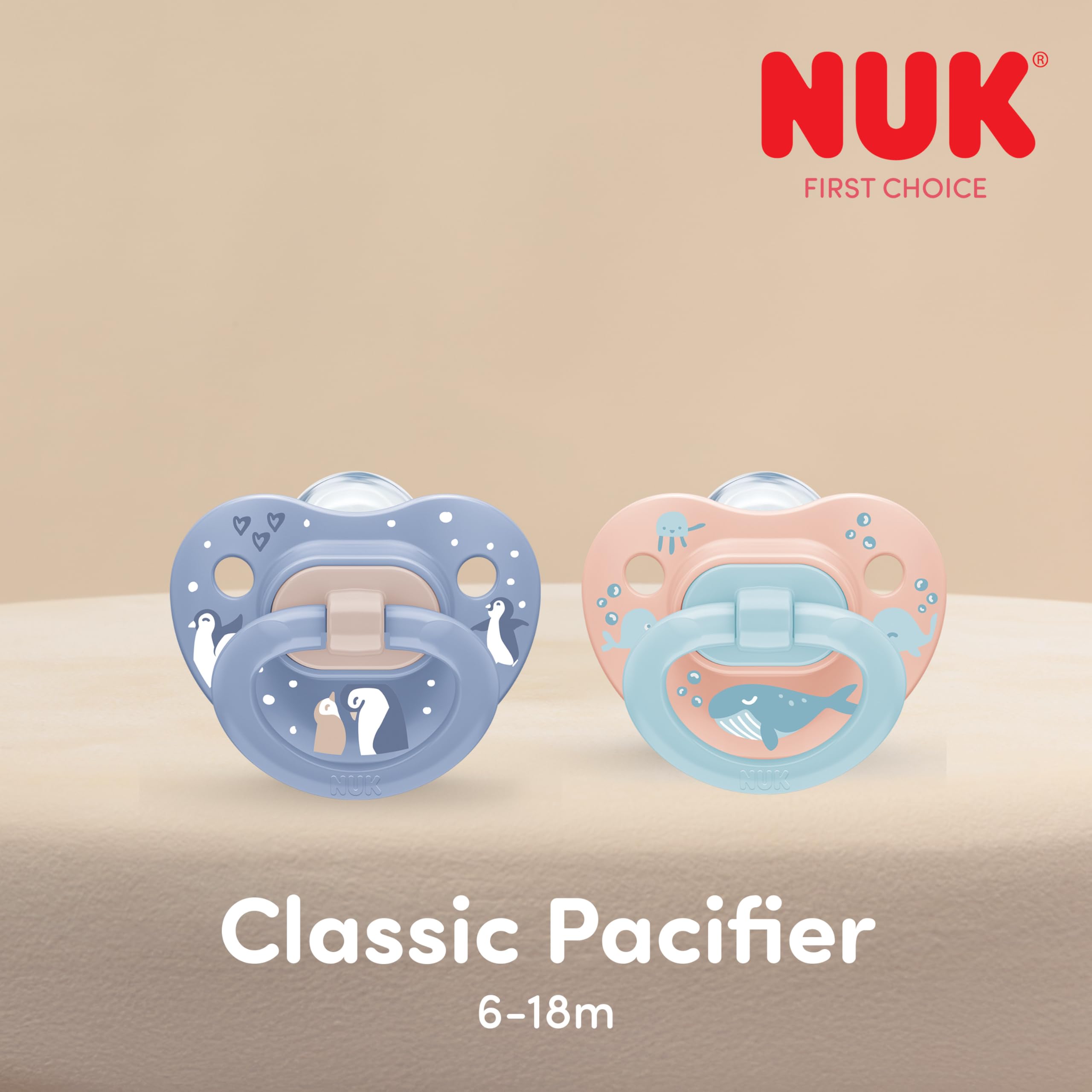 NUK pacifier in purple and blue with happy baby using pacifier