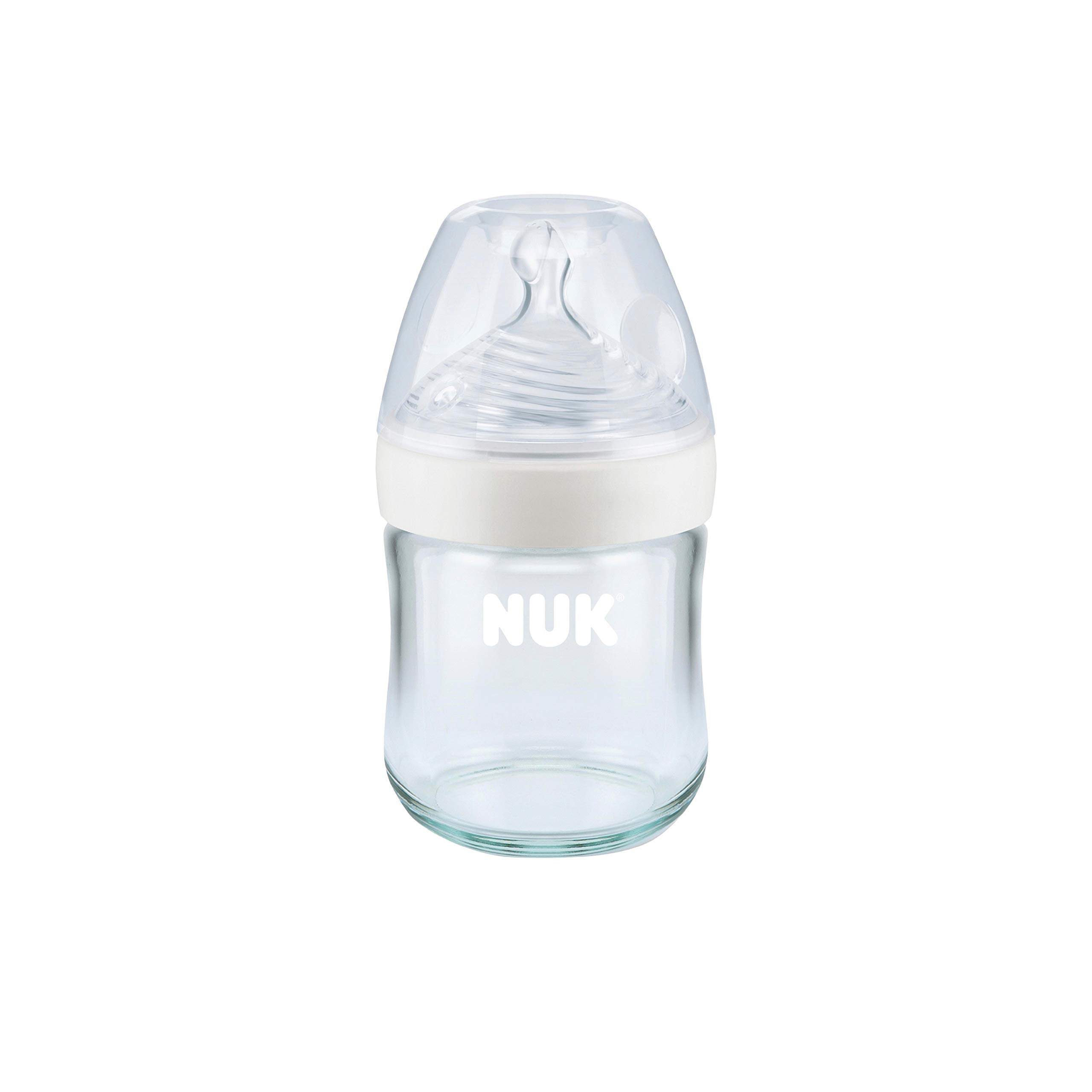 NUK Simply Natural bottle cap and glass set ready for travel use