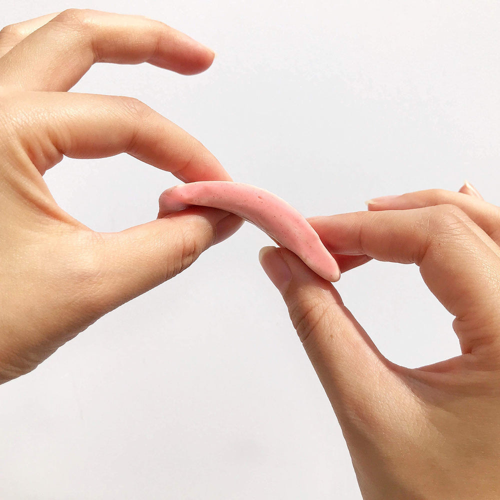 Numa Taffy Candy chewy texture highlights creamy strawberry bite.