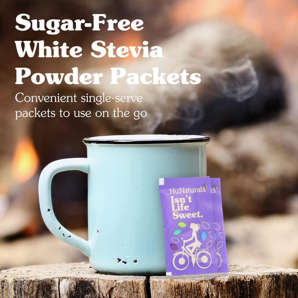 NuNaturals stevia powder packet close-up dissolving in a hot beverage.