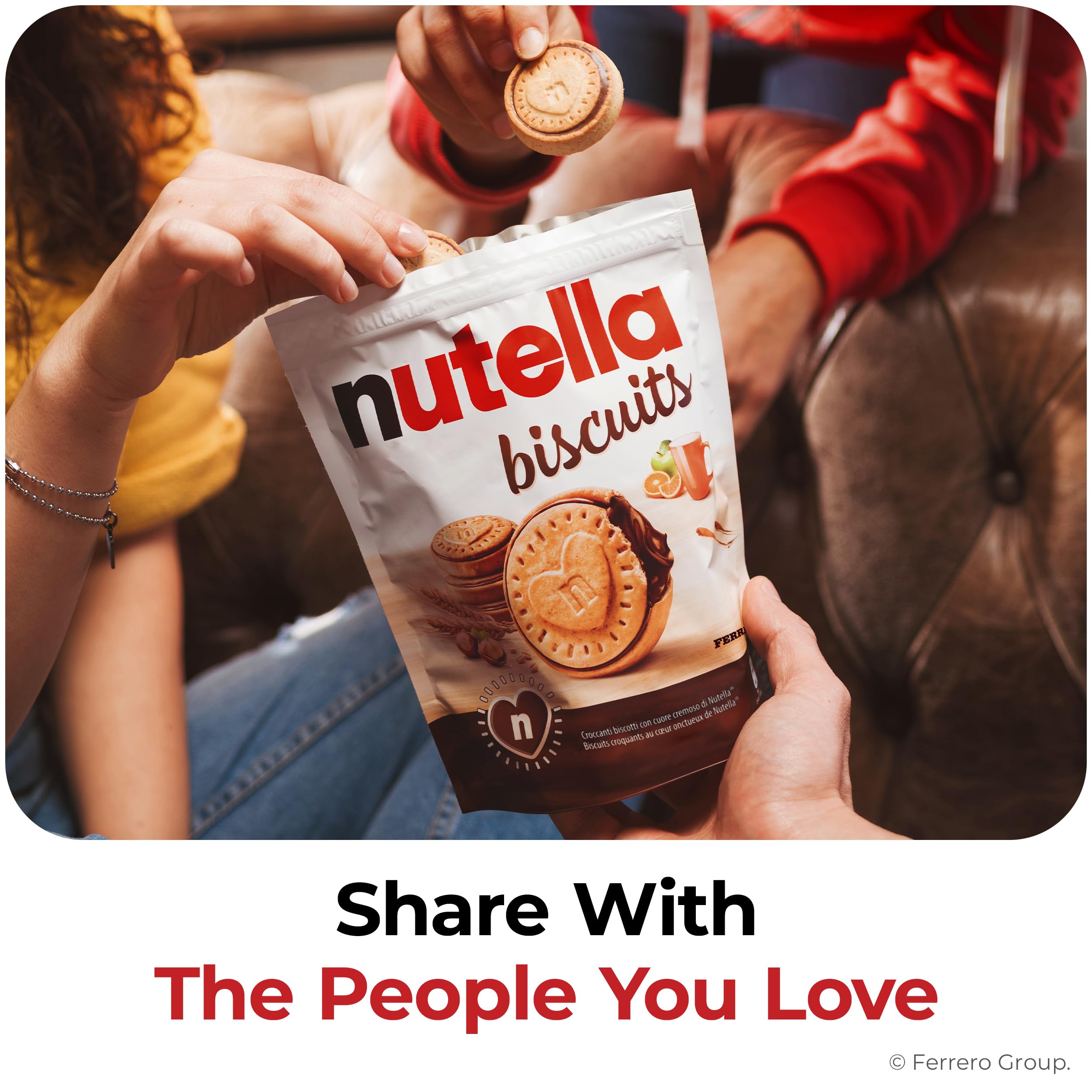 Nutella Biscuits snack-pack held in hand for on-the-go sweetness.