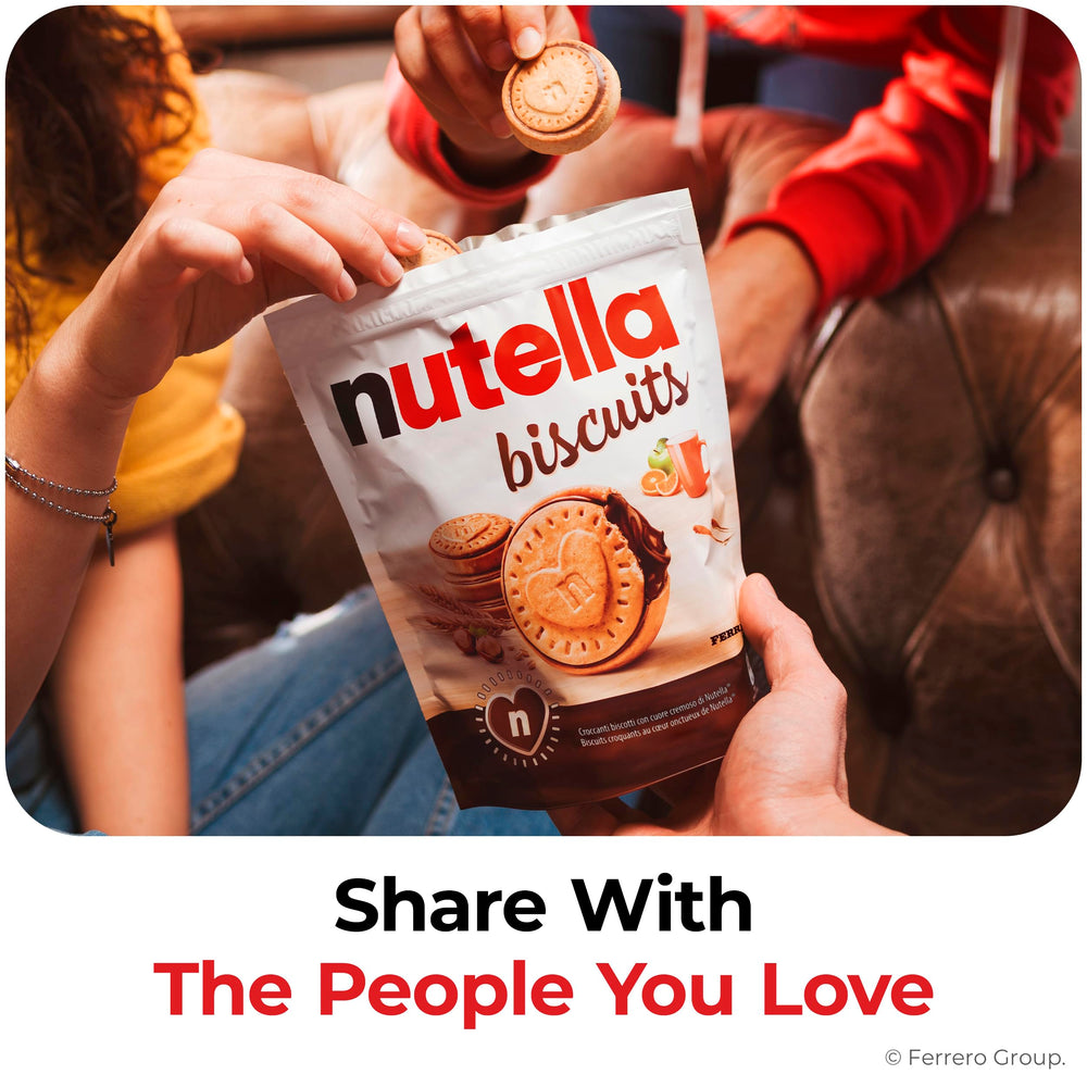 Nutella Biscuits snack-pack held in hand for on-the-go sweetness.