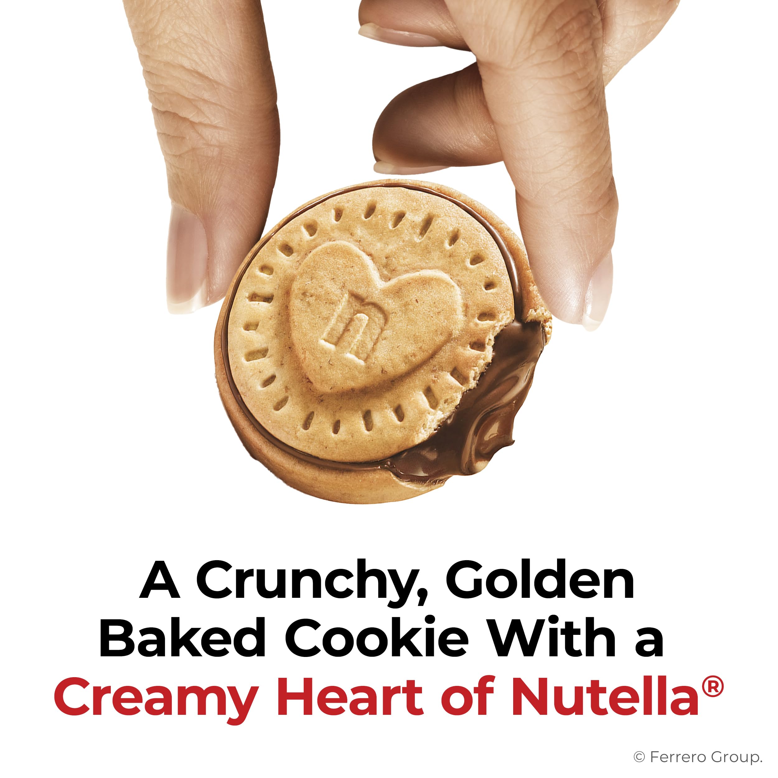 Nutella Biscuits bite view showing chocolate hazelnut filling contrast.