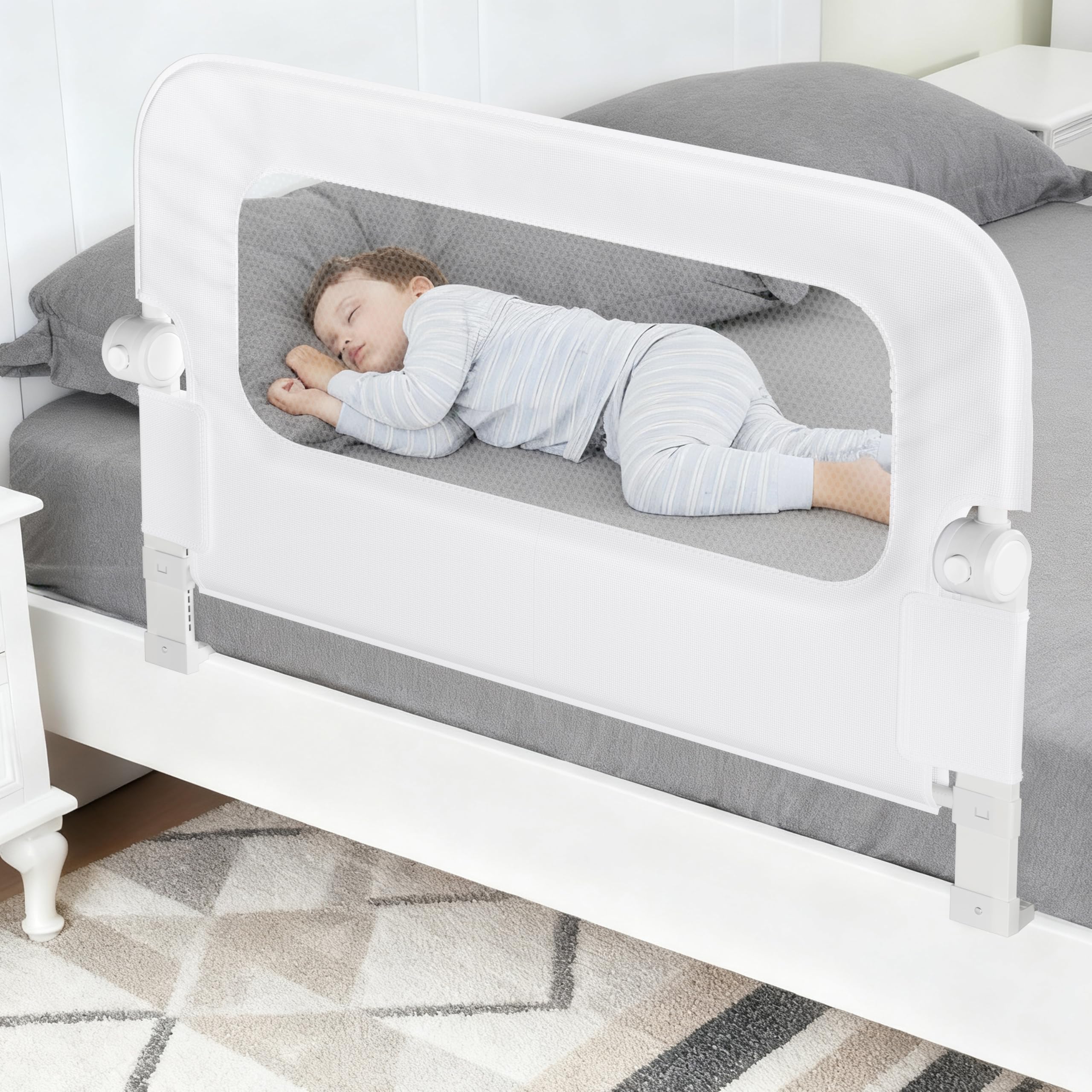 NUTIKAS baby bed rail guard with swing-down feature for easy, quiet access.