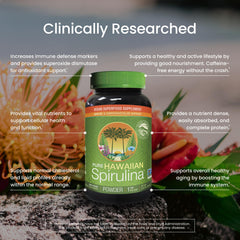 Scooper beside a frosty smoothie with Nutrex Hawaii spirulina powder