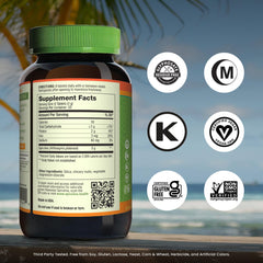 Close-up of Nutrex Hawaii spirulina tablets showing compact vegan capsules